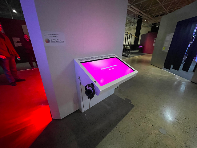 Rear view of the Upright Rainbow exhibition with interactive kiosk